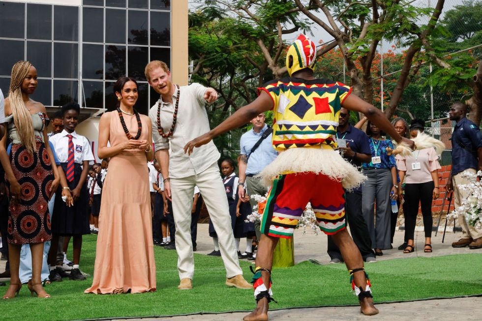 Prince Harry and Meghan Sent a Bold Message to King Charles and Prince William With Their Nigeria Trip